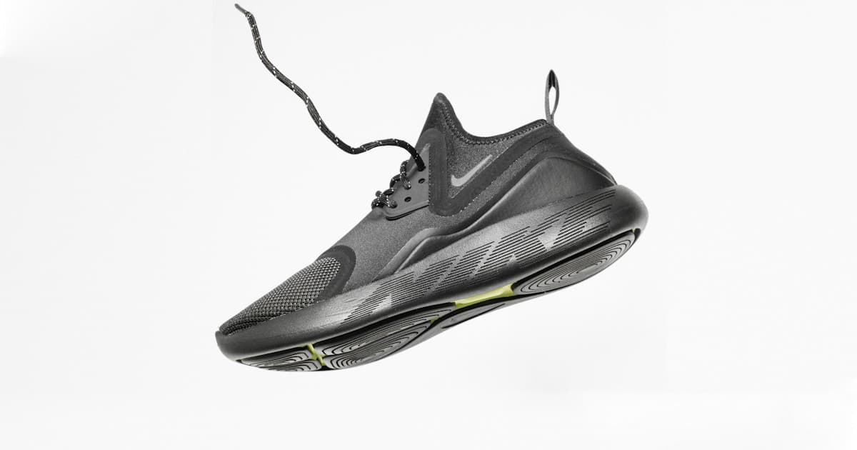 Multiple sneaker raffle entry confirmations displayed on a monitor alongside a bot dashboard running automated raffle entries.